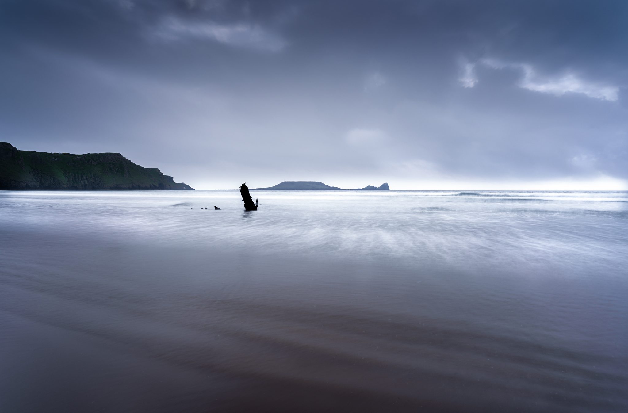 Rhossili Bay Beach, Rhossili, Swansea SA3, UK. Landscape photograph by Tim Burgess, winner of the Shoot The Frame Landscape photography award, May 2023