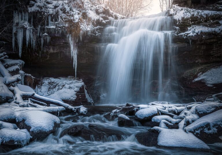 Waterfall in Winter. Landscape photograph by Leeian Dai, winner of the Shoot The Frame Landscape photography award, January 2024