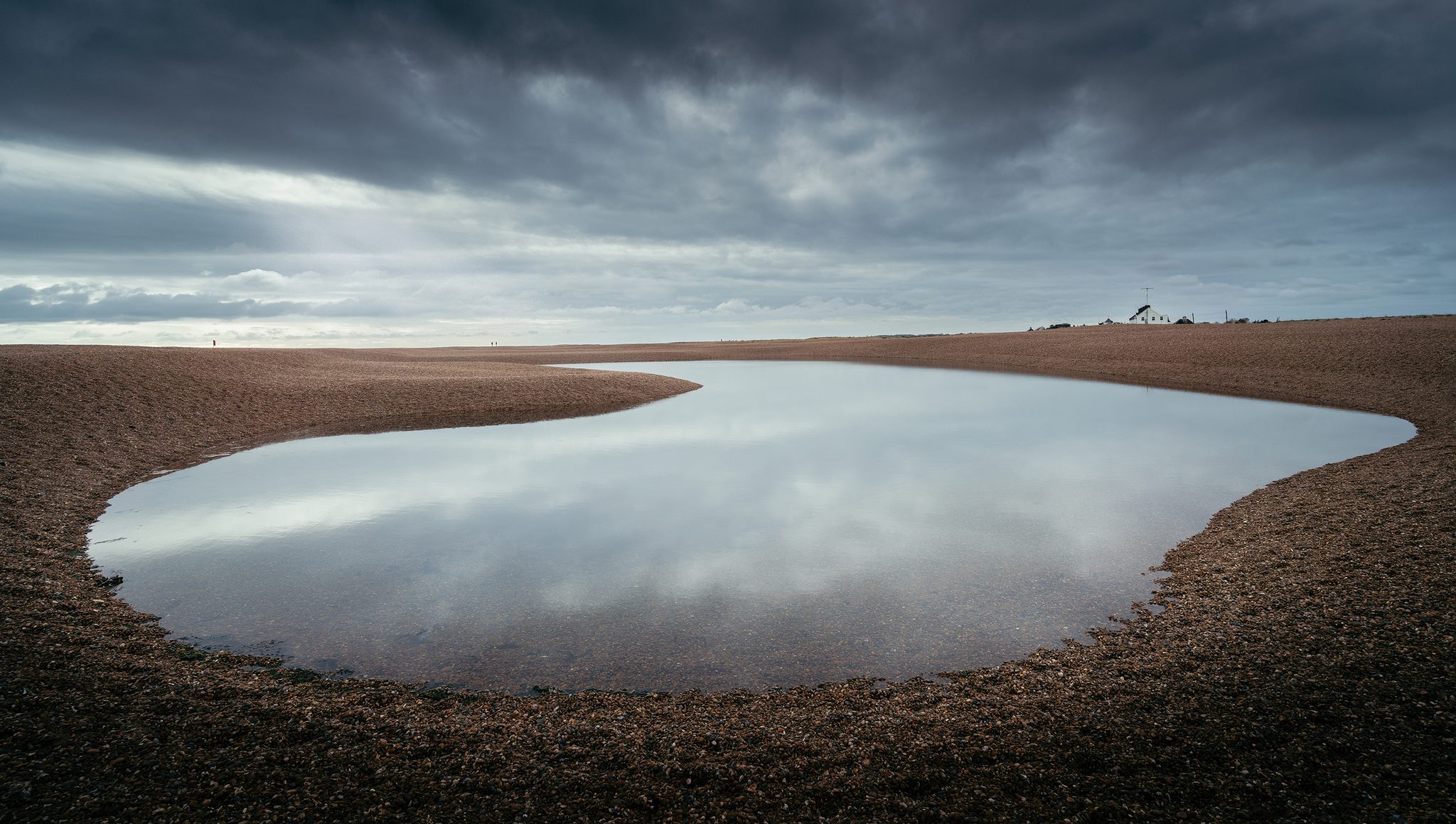 A Lonely Planet, Shingle Street, Woodbridge IP12 3BE, UK. Landscape photograph by Tim Burgess, finalist in the Shoot The Frame Landscape photography award, April 2024