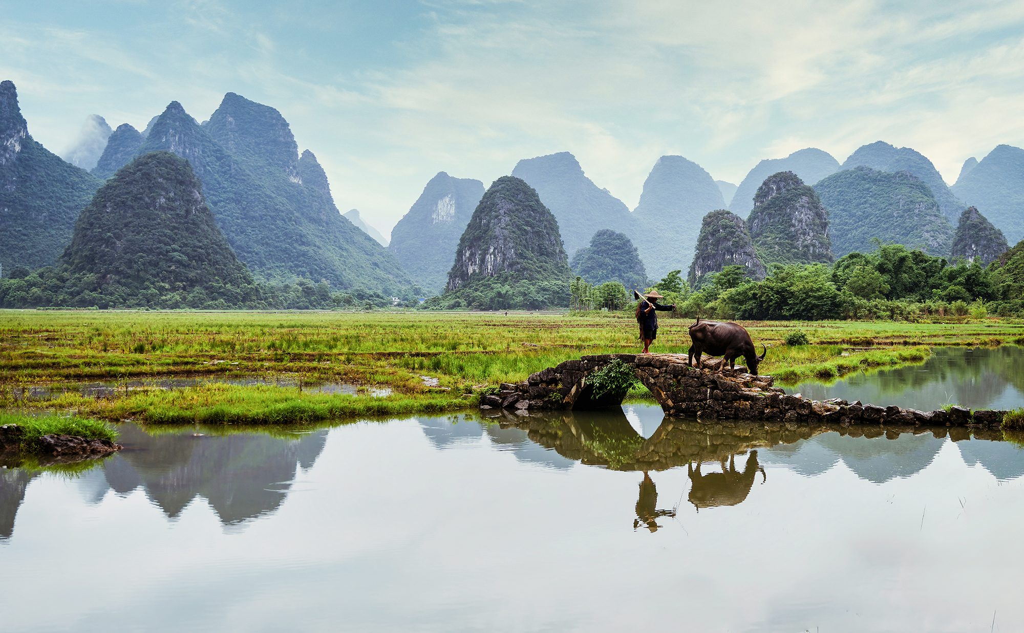 Gulin Farmer, China. Landscape photograph by ChanOnn Fong, finalist in the Shoot The Frame Landscape photography award, June 2024